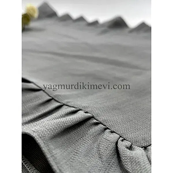 Naturel Fırfırlı Keten Kumaş Masa Örtüsü Naturel fırfırlı keten kumaş masa örtüsü zarif tasarımı ile